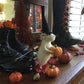 Ratón de Halloween con una calabaza